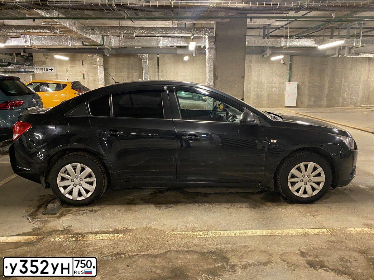 Фото автомобиля CHEVROLET CRUZE, 2011 — госномер К726ЕУ799. Цвет: ЧЕРНЫЙ