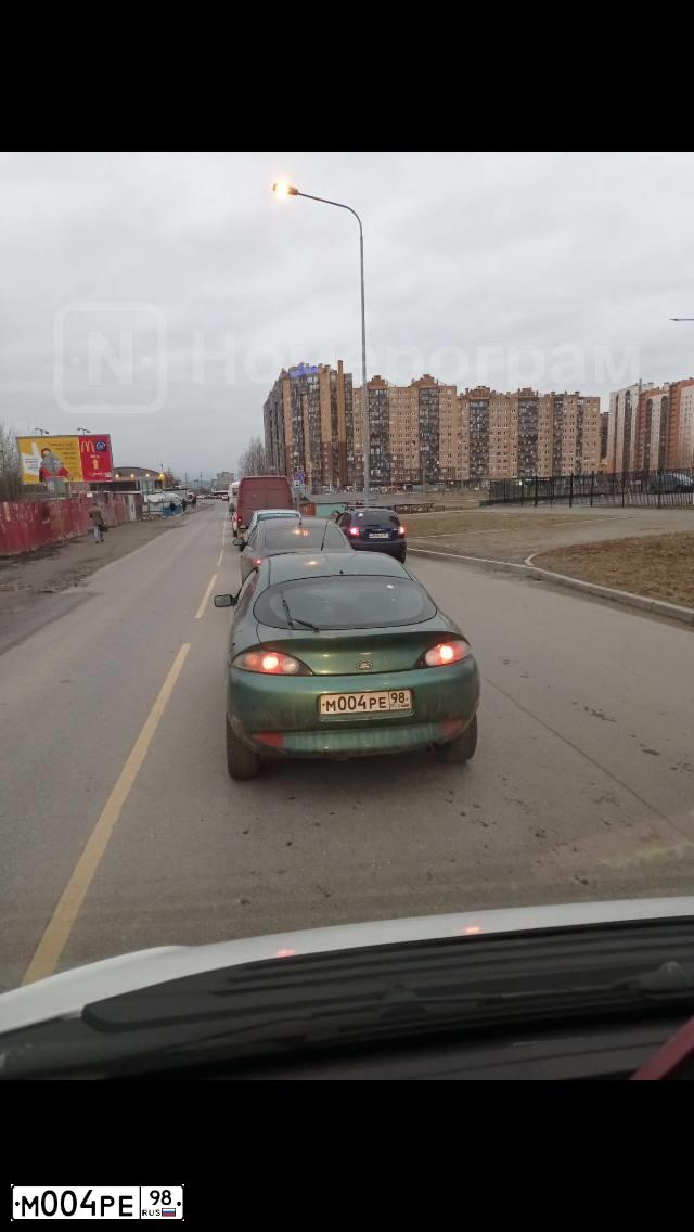 Фото автомобиля FORD PUMA, 1997 — госномер М004РЕ98. Цвет: ЗЕЛЕНЫЙ