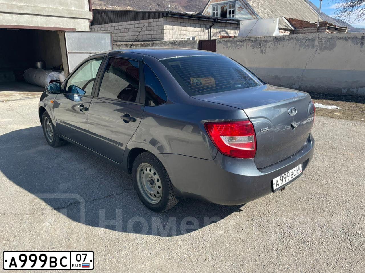Фото автомобиля LADA 2170 PRIORA, 2011 — госномер Е673ЕР07. Цвет: Сине-Черный