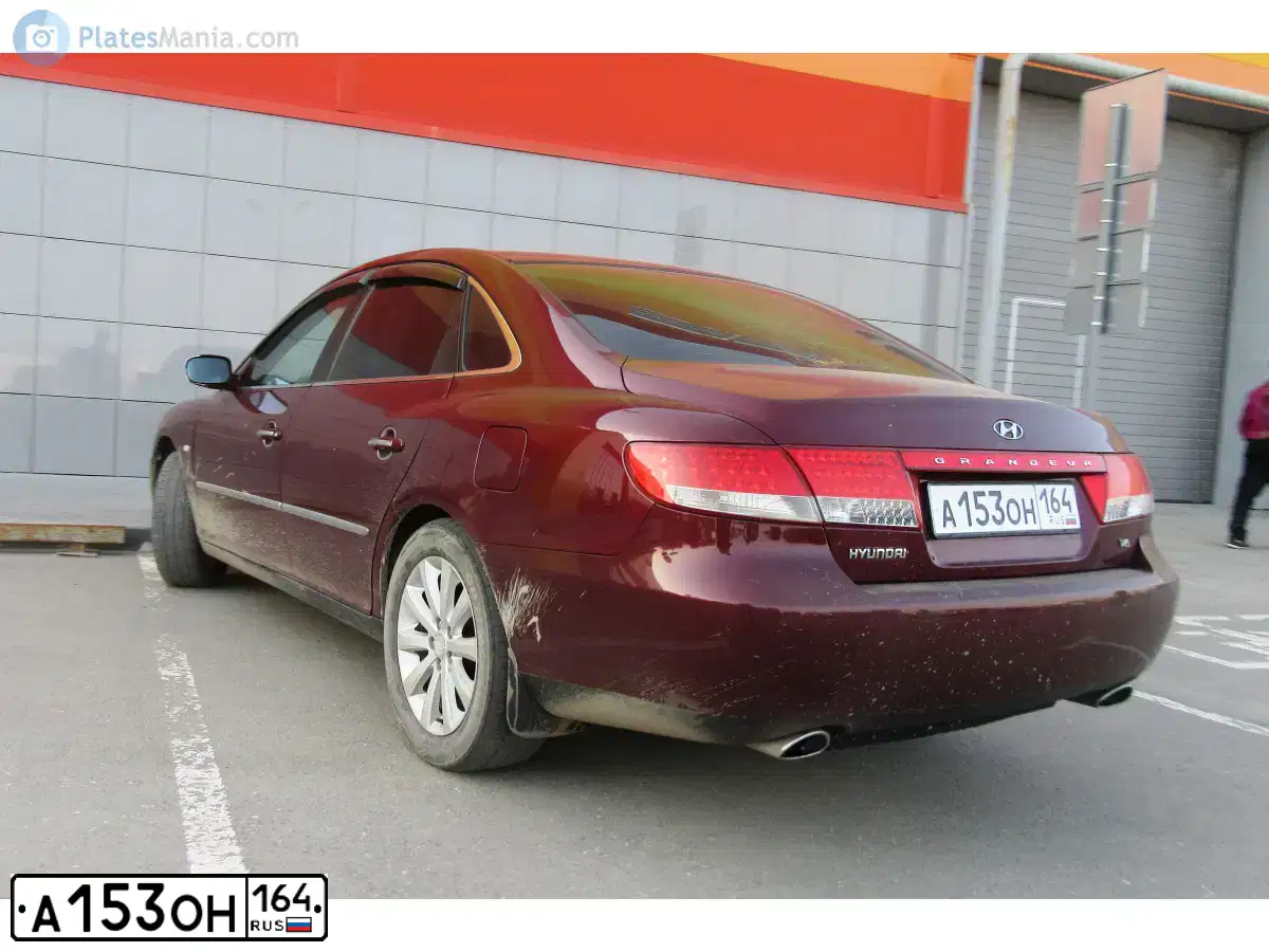Фото автомобиля HYUNDAI GRANDEUR, 2008 — госномер А153ОН164. Цвет: ТЕМНО ВИШНЕВЫЙ