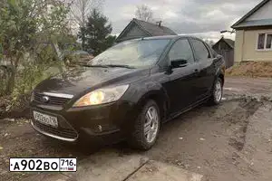 Фото автомобиля FORD FOCUS, 2008 — госномер Н185ХТ716. Цвет: ЧЕРНЫЙ