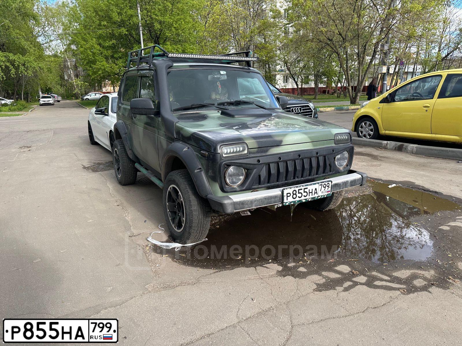 Фото автомобиля LADA 2121 NIVA, 2018 — госномер Р855НА799. Цвет: КОМБИН.ЗЕЛЕНЫЙ-ЧЕРНЫЙ