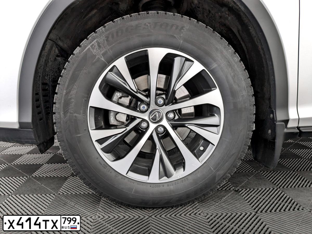 Фото автомобиля ЛЕКСУС RX 300 АGL25L АWТGZW, 2020 — госномер Х414ТХ799. Цвет: Белый