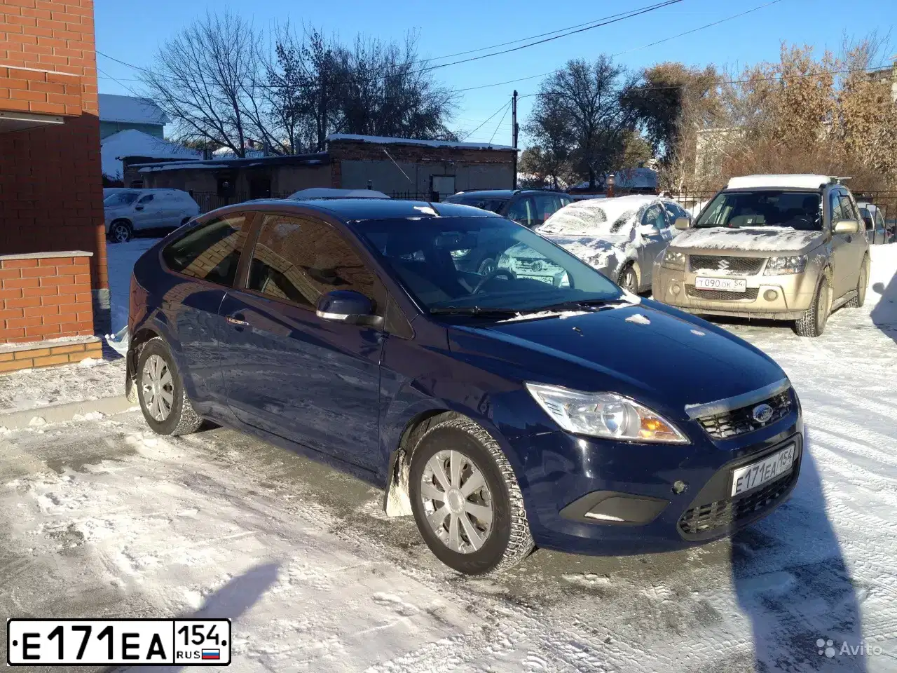 Фото автомобиля FORD FOCUS, 2010 — госномер М599МТ142. Цвет: Темно-синий