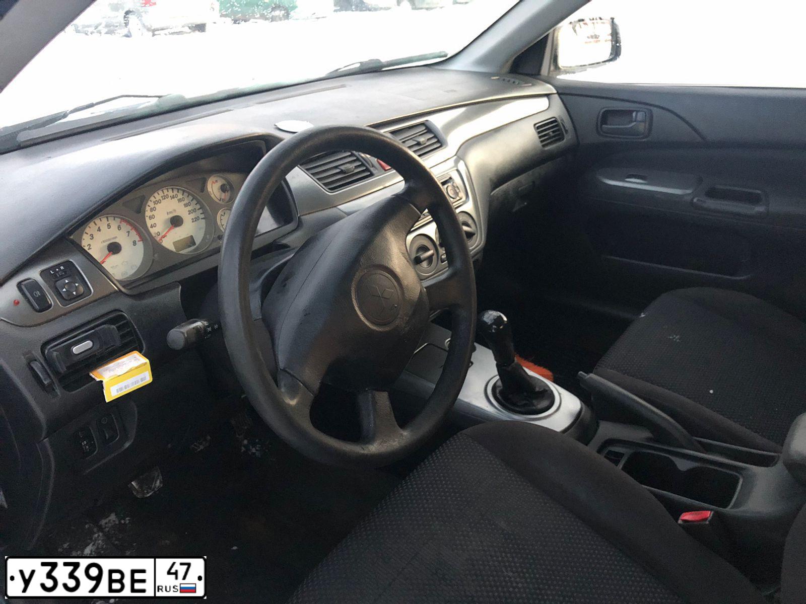 Фото автомобиля MITSUBISHI LANCER, 2005 — госномер С923ОХ198. Цвет: СВЕТЛО-СЕРО-ЗЕЛЕНЫЙ