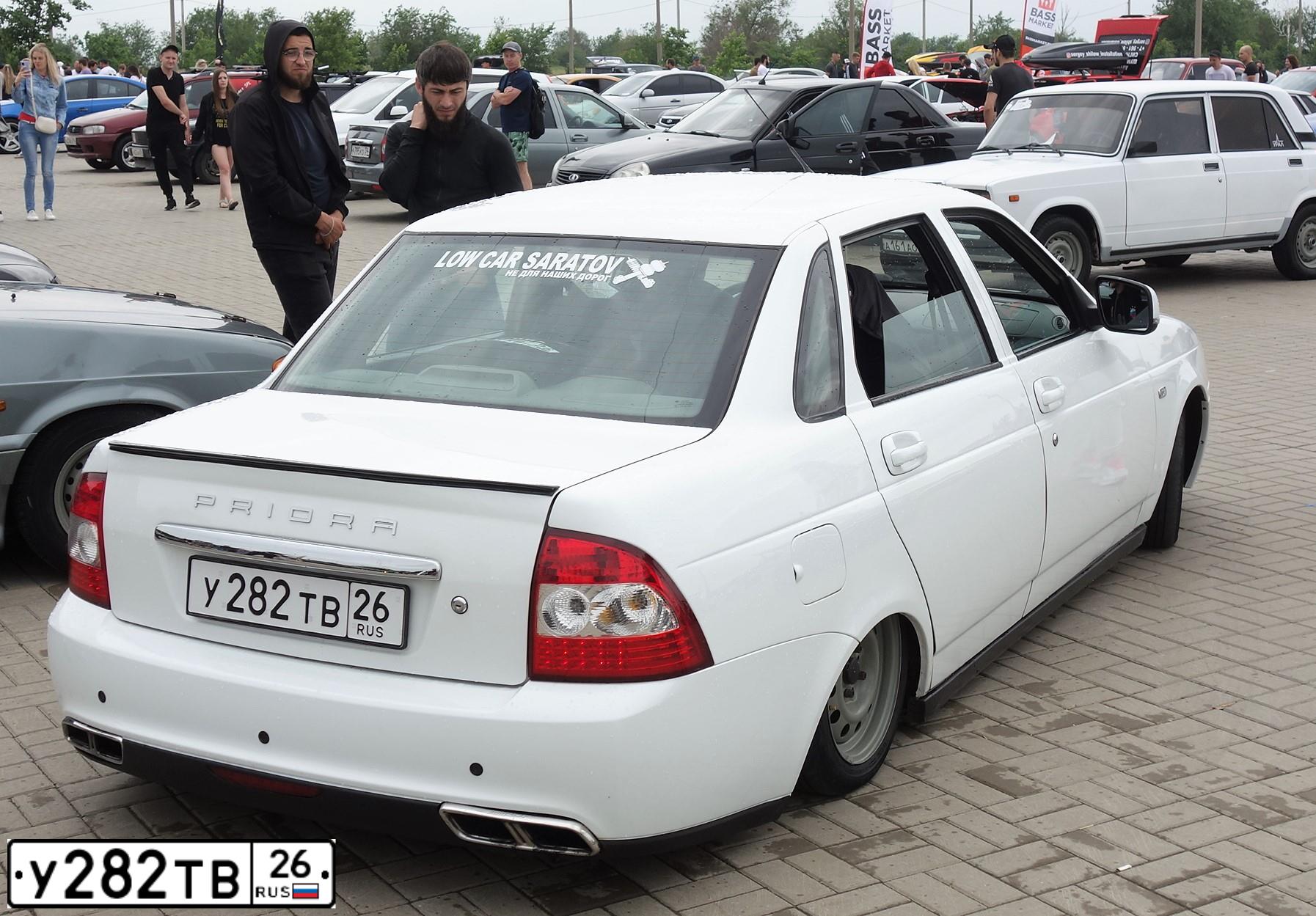 Фото автомобиля LADA 2170 PRIORA, 2011 — госномер М125КА164. Цвет: БЕЛЫЙ