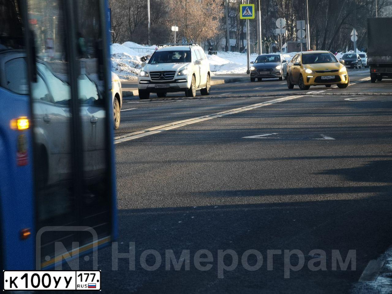 Фото автомобиля MITSUBISHI COLT, 2005 — госномер К100ЕЕ177. Цвет: ЧЕРНЫЙ