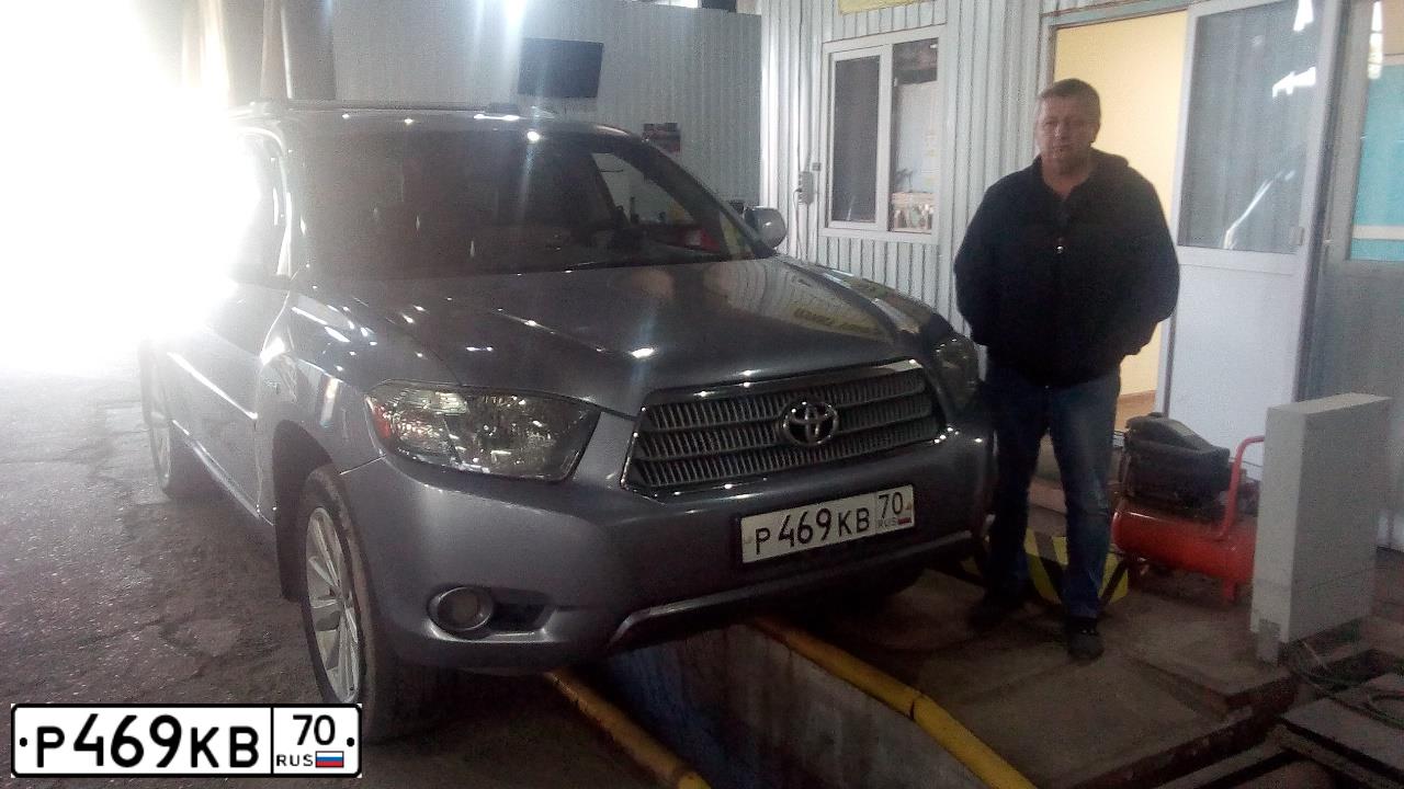 Фото автомобиля TOYOTA HIGHLANDER, 2009 — госномер Р469КВ70. Цвет: голубой
