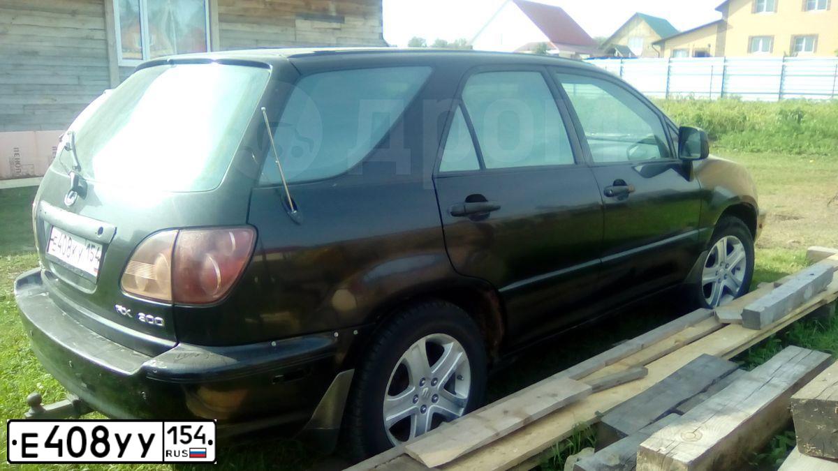 Фото автомобиля HYUNDAI IX 35, 2012 — госномер Р309РТ154. Цвет: СЕРЫЙ