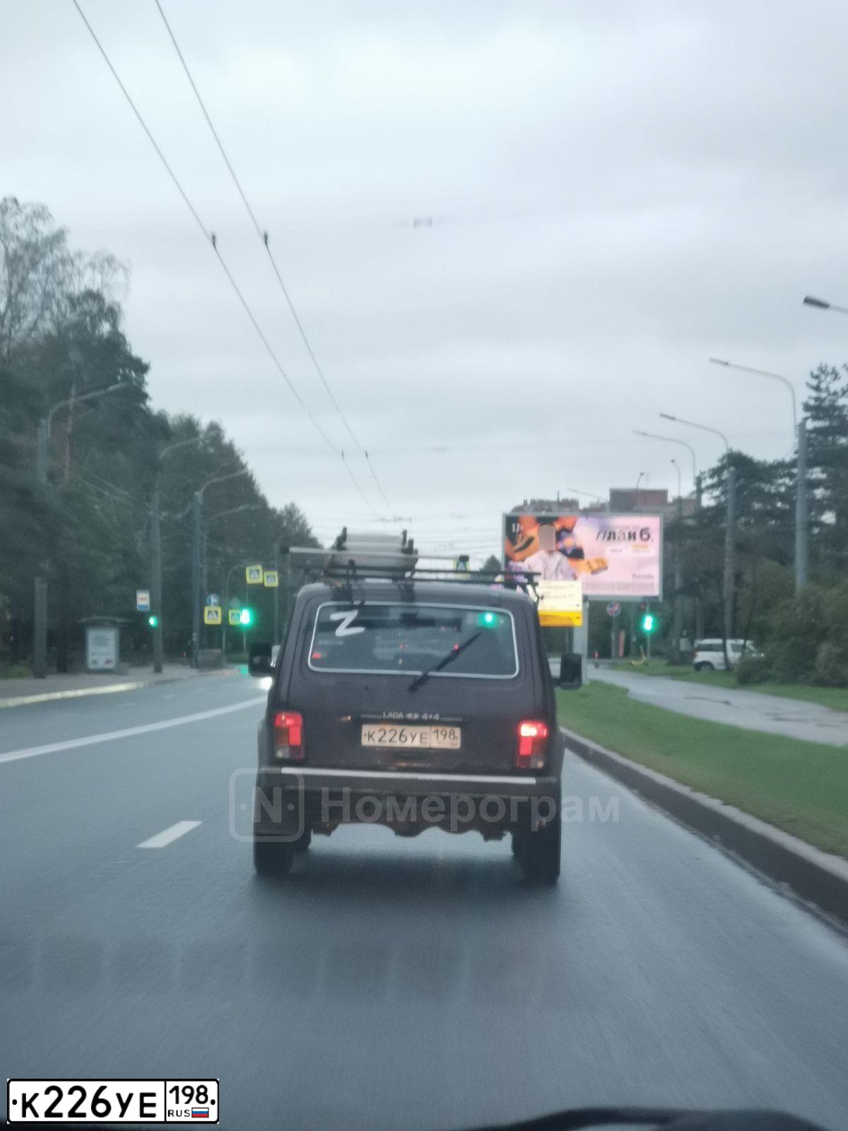Фото автомобиля LADA 2121 NIVA, 2008 — госномер К226УЕ198. Цвет: ТЕМНО-ВИШНЕВЫЙ