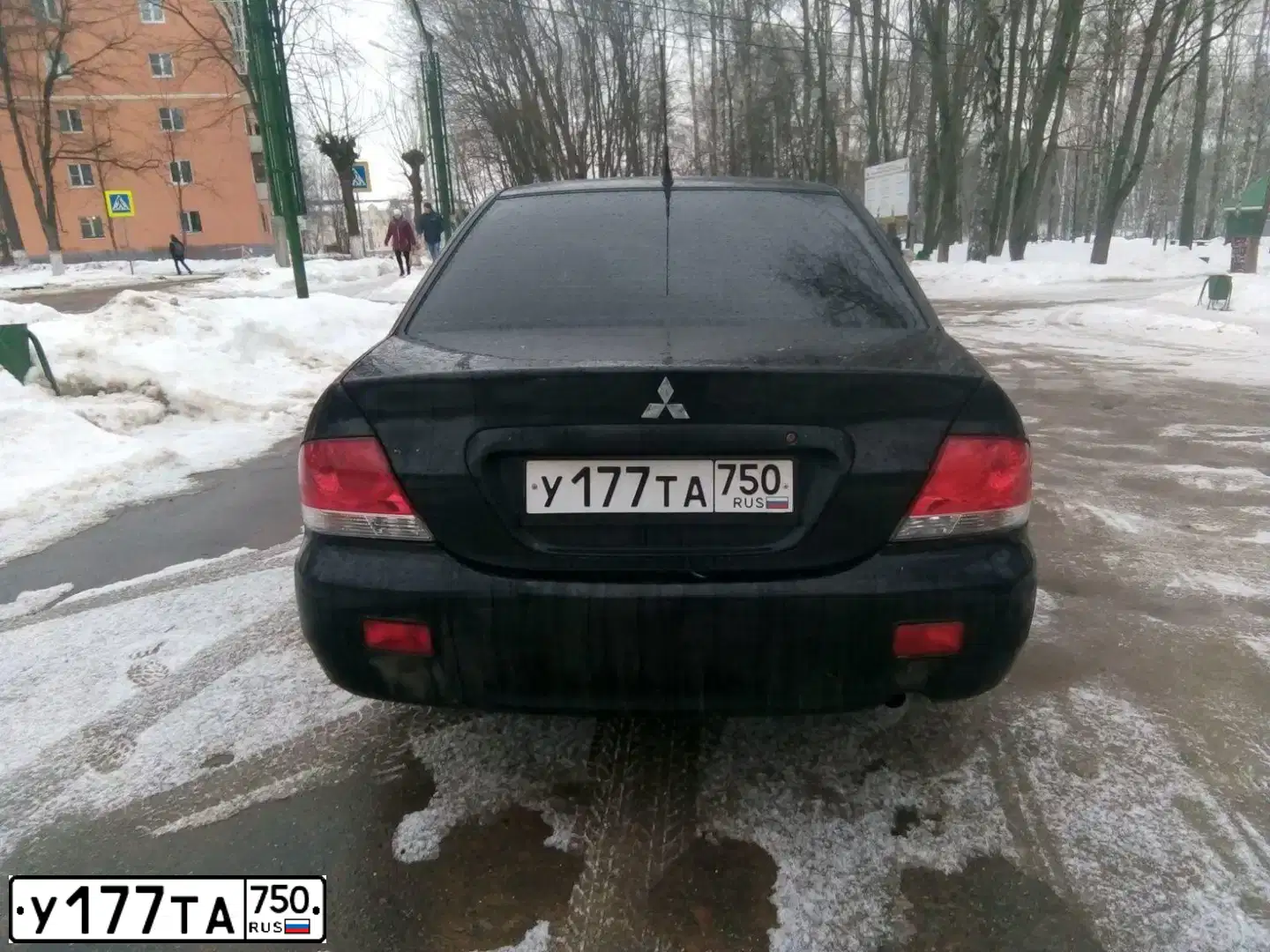 Фото автомобиля MITSUBISHI LANCER, 2007 — госномер Р698УМ750. Цвет: ЧЕРНЫЙ