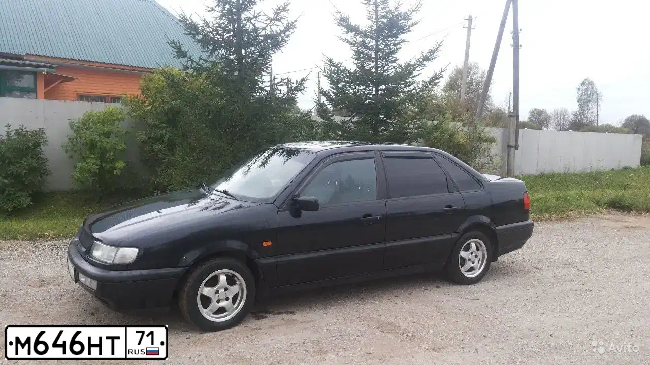 Фото автомобиля VOLKSWAGEN PASSAT, 1995 — госномер М646НТ71. Цвет: ЧЕРНЫЙ