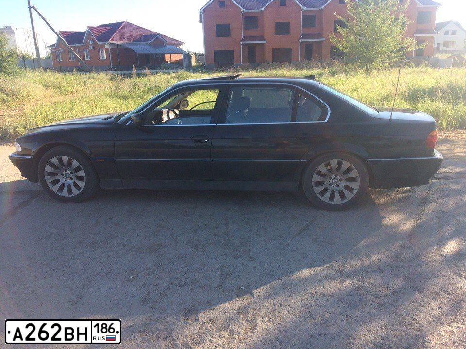Фото автомобиля BMW W SERIE 7, 1994 — госномер А817ОУ01. Цвет: ЧЕРНЫЙ