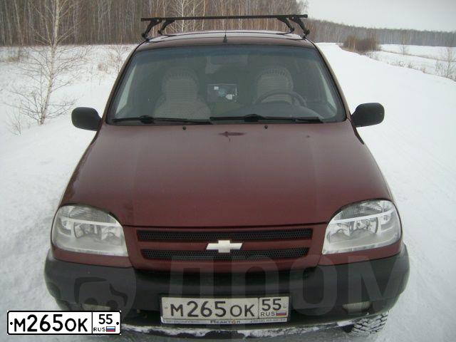 Фото автомобиля CHEVROLET NIVA, 2003 — госномер М265ОК55. Цвет: СЕРЕБРИСТО-КРАСНЫЙ