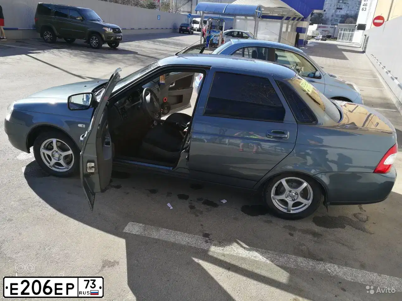 Фото автомобиля LADA 2170 PRIORA, 2014 — госномер Е206ЕР73. Цвет: Серо-Синий