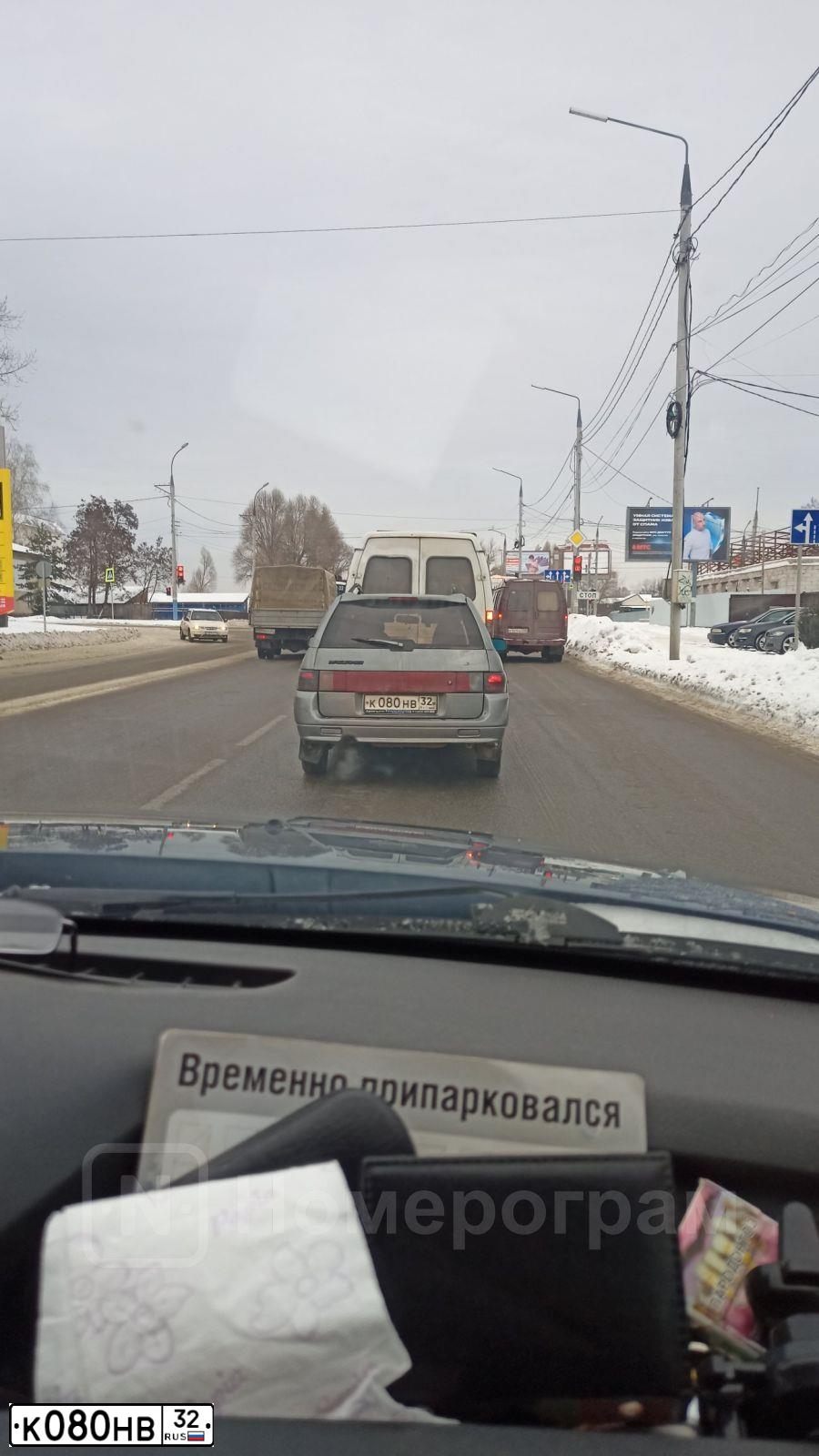 Фото автомобиля LADA 2111, 2005 — госномер К080НВ32. Цвет: СРЕДНИЙ СЕРО-ЗЕЛЕНЫЙ МЕТ