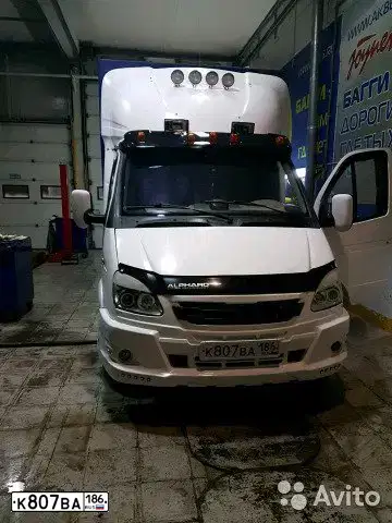 Фото автомобиля GAZ 3302 GAZEL, 2005 — госномер Т640КА72. Цвет: Белый