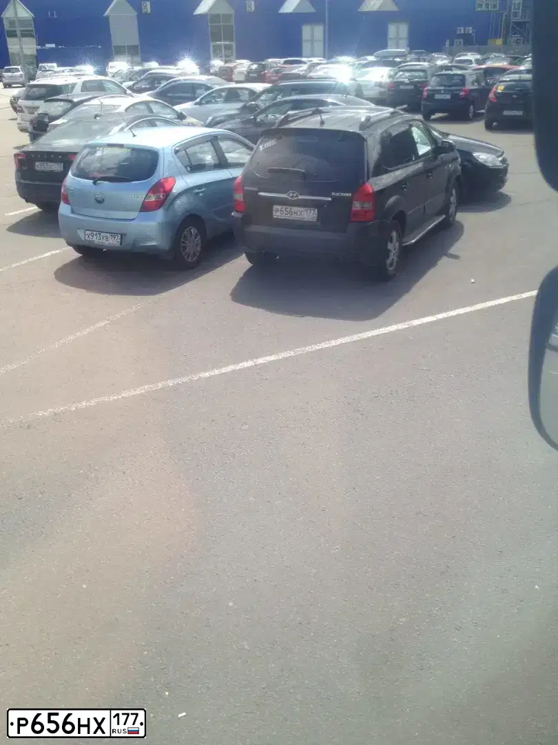 Фото автомобиля HYUNDAI TUCSON, 2006 — госномер О182ОК790. Цвет: ЧЕРНЫЙ