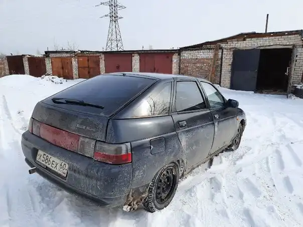 Фото автомобиля LADA 2112, 2006 — госномер Х586ЕХ60. Цвет: ЧЕРНЫЙ