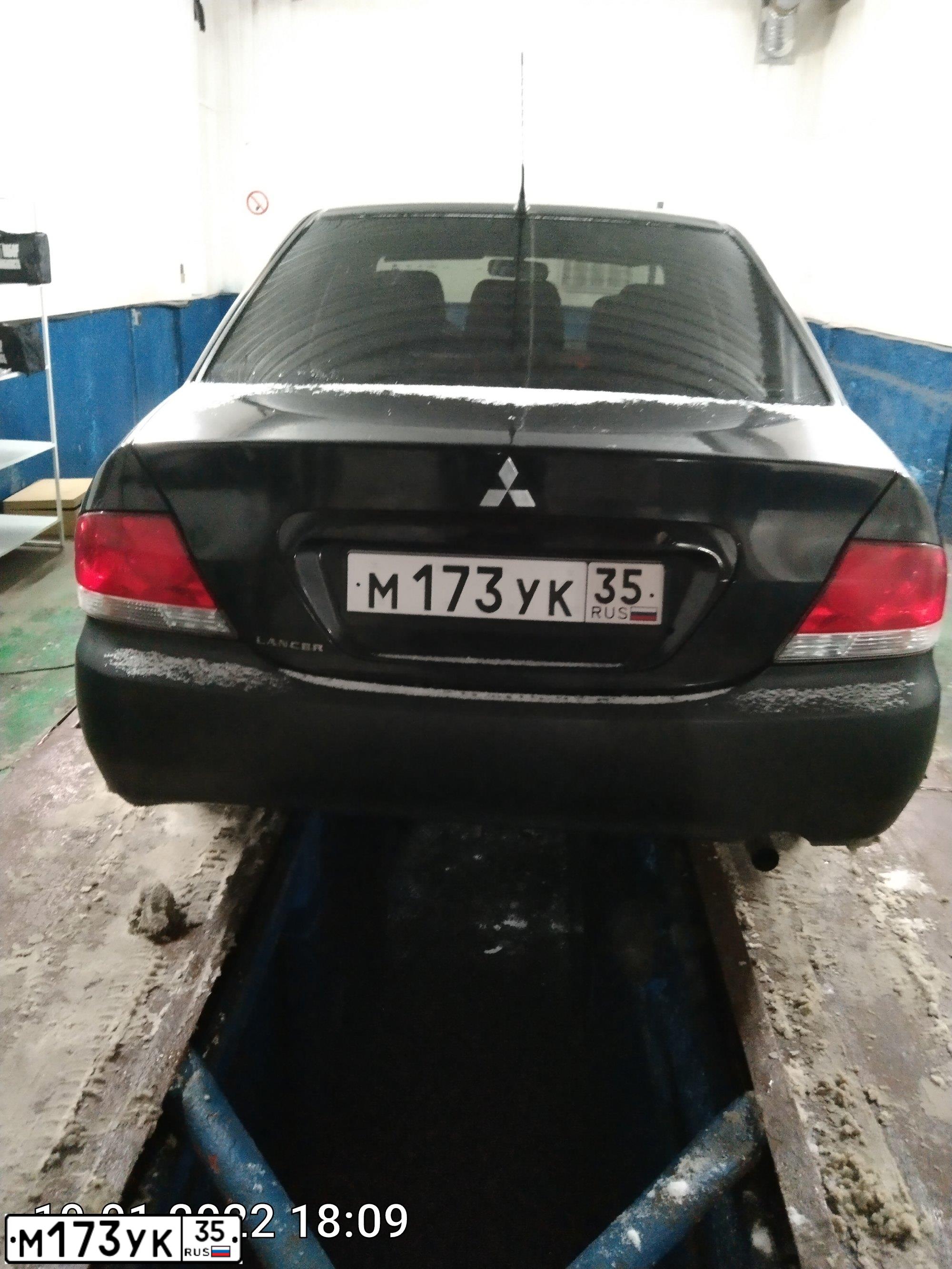 Фото автомобиля MITSUBISHI LANCER, 2004 — госномер В440ММ35. Цвет: ЧЕРНЫЙ