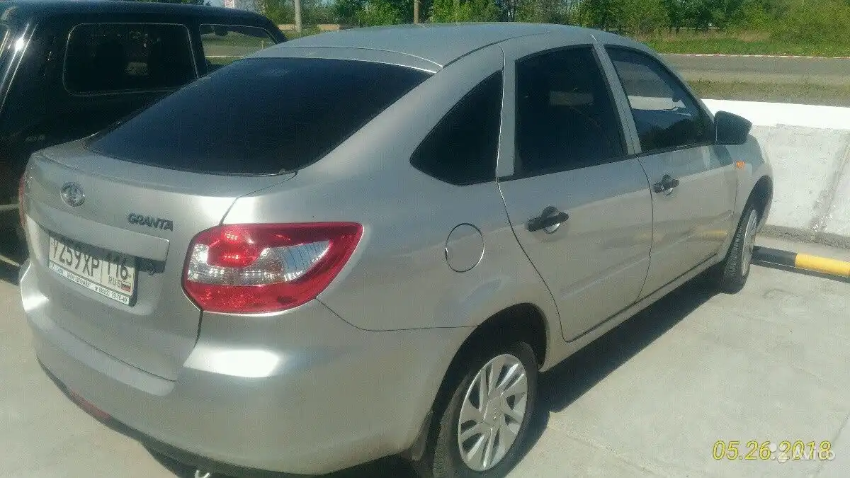 Фото автомобиля MITSUBISHI LANCER, 2008 — госномер У259ХР716. Цвет: СЕРЫЙ