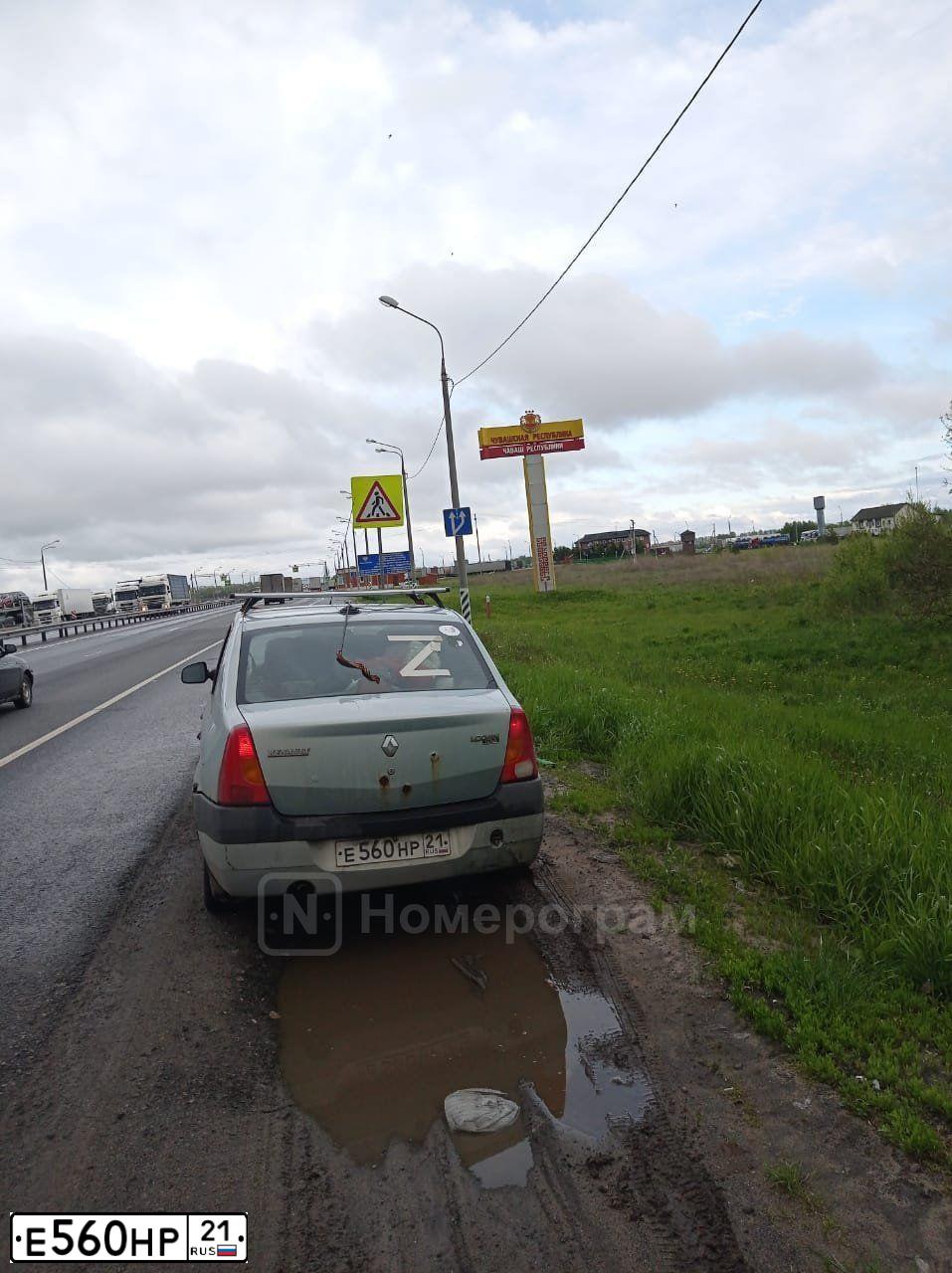 Фото автомобиля MAZDA 3, 2008 — госномер Е560НР21. Цвет: СЕРЫЙ