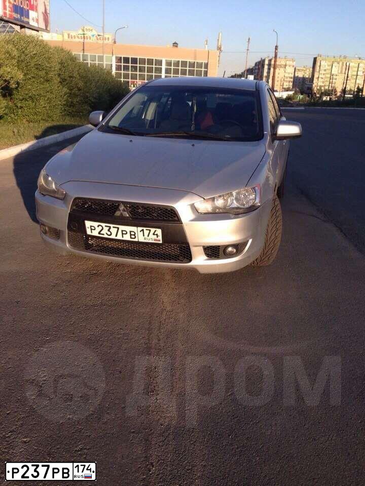 Фото автомобиля MITSUBISHI LANCER, 2007 — госномер Р237РВ174. Цвет: СЕРЕБРИСТЫЙ