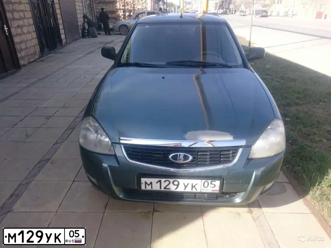Фото автомобиля LADA 2170 PRIORA, 2011 — госномер М129УК05. Цвет: СЕРО-СИНЕ-ЗЕЛЕНЫЙ