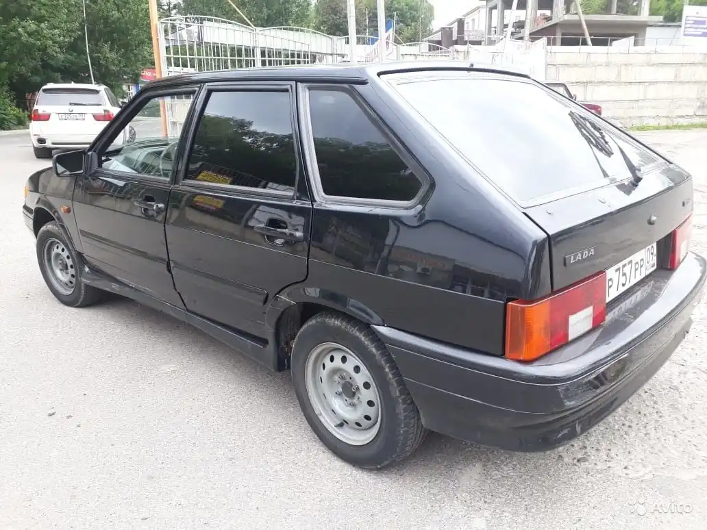 Фото автомобиля LADA 2114 SAMARA, 2011 — госномер Р757РР09. Цвет: СИНЕ-ЧЕРНЫЙ