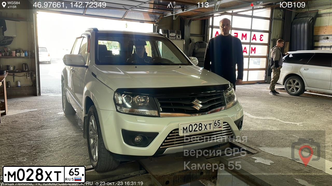 Фото автомобиля SUZUKI /GRAND/ VITARA, 2013 — госномер М028ХТ65. Цвет: Белый