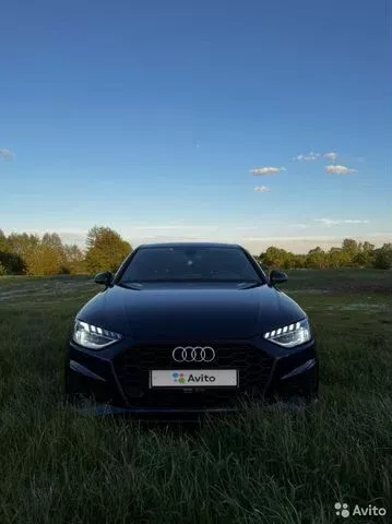 Фото автомобиля AUDI A4, 2020 — госномер Р597КН48. Цвет: синий