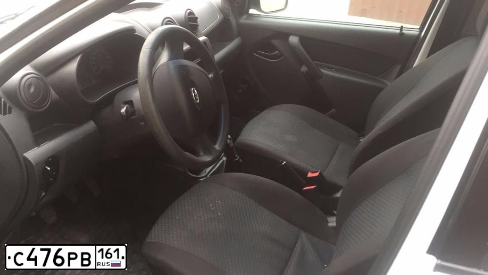 Фото автомобиля LADA 2190 GRANTA, 2013 — госномер М581ЕО134. Цвет: Белый