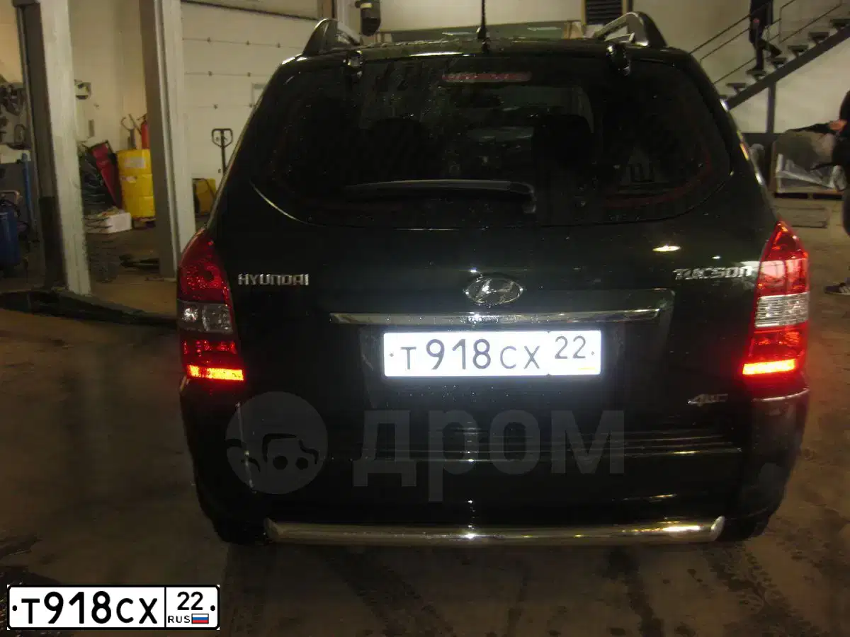 Фото автомобиля HYUNDAI TUCSON, 2008 — госномер Т918СХ22. Цвет: Темно-зеленый