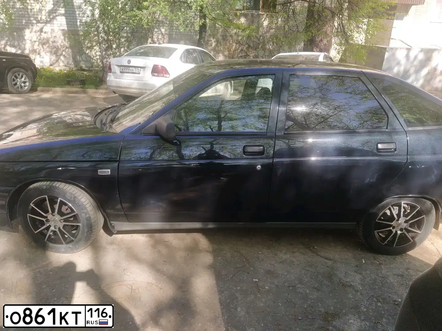 Фото автомобиля LADA 2112 LADA, 2005 — госномер О107АН702. Цвет: ГРАФИТОВЫЙ МЕТАЛЛИК