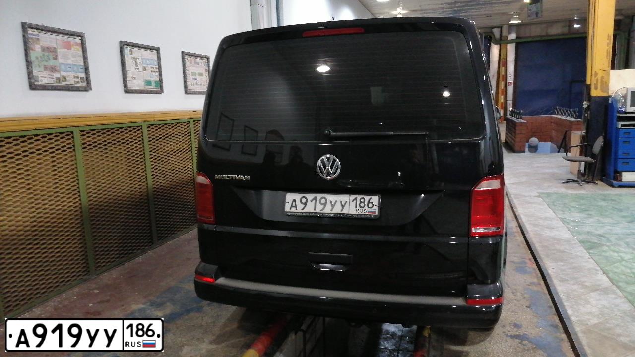 Фото автомобиля VOLKSWAGEN MULTIVAN, 2018 — госномер А919УУ186. Цвет: ЧЕРНЫЙ