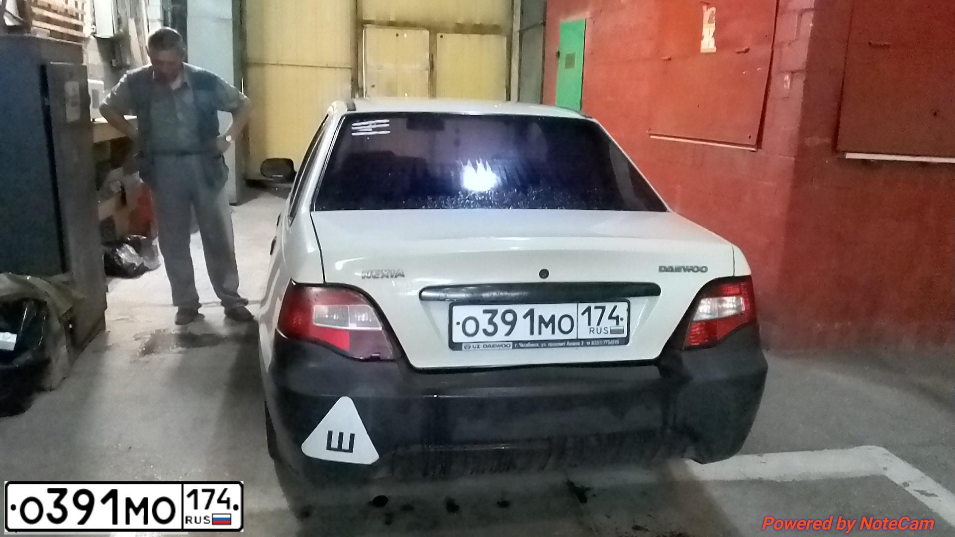 Фото автомобиля DAEWOO NEXIA, 1910 — госномер О391МО174. Цвет: БЕЛЫЙ