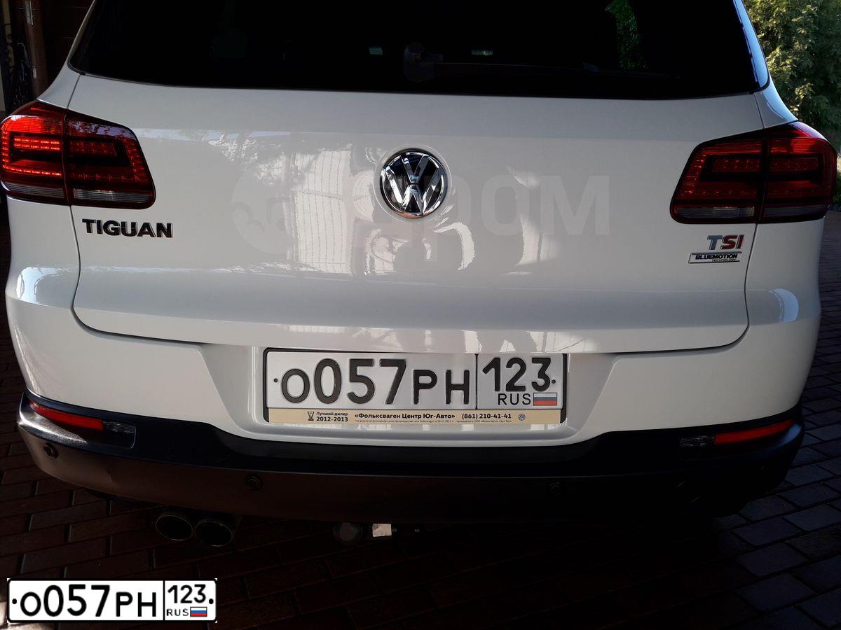 Фото автомобиля VOLKSWAGEN TIGUAN, 2015 — госномер О057РН123. Цвет: Белый
