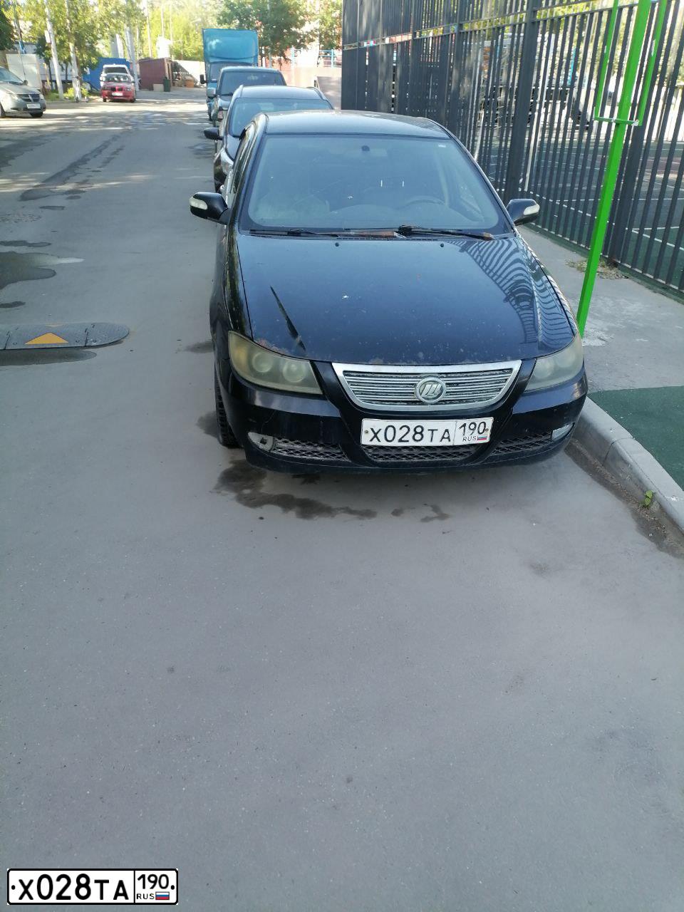 Фото автомобиля LIFAN SOLANO, 2012 — госномер Х028ТА190. Цвет: ЧЕРНЫЙ