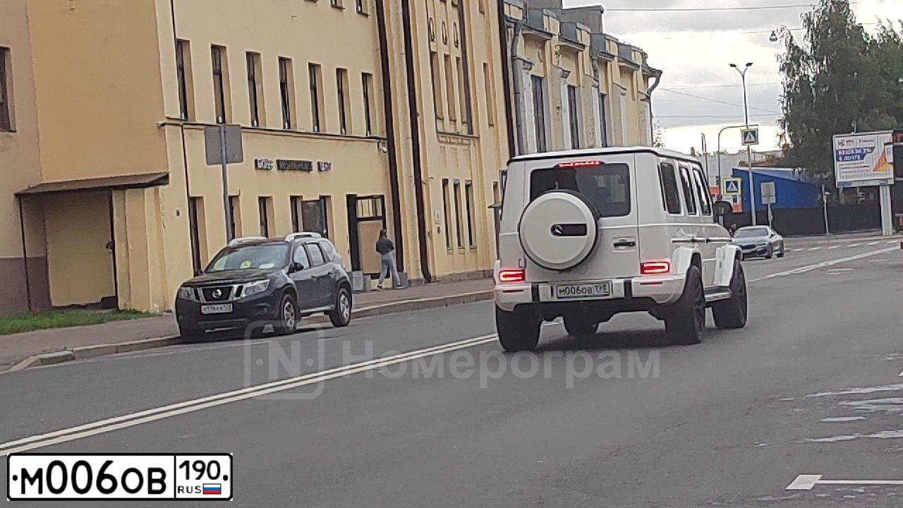 Фото автомобиля KAMAZ 6520 /6X4/, 2006 — госномер М006ОВ190. Цвет: Оранжевый