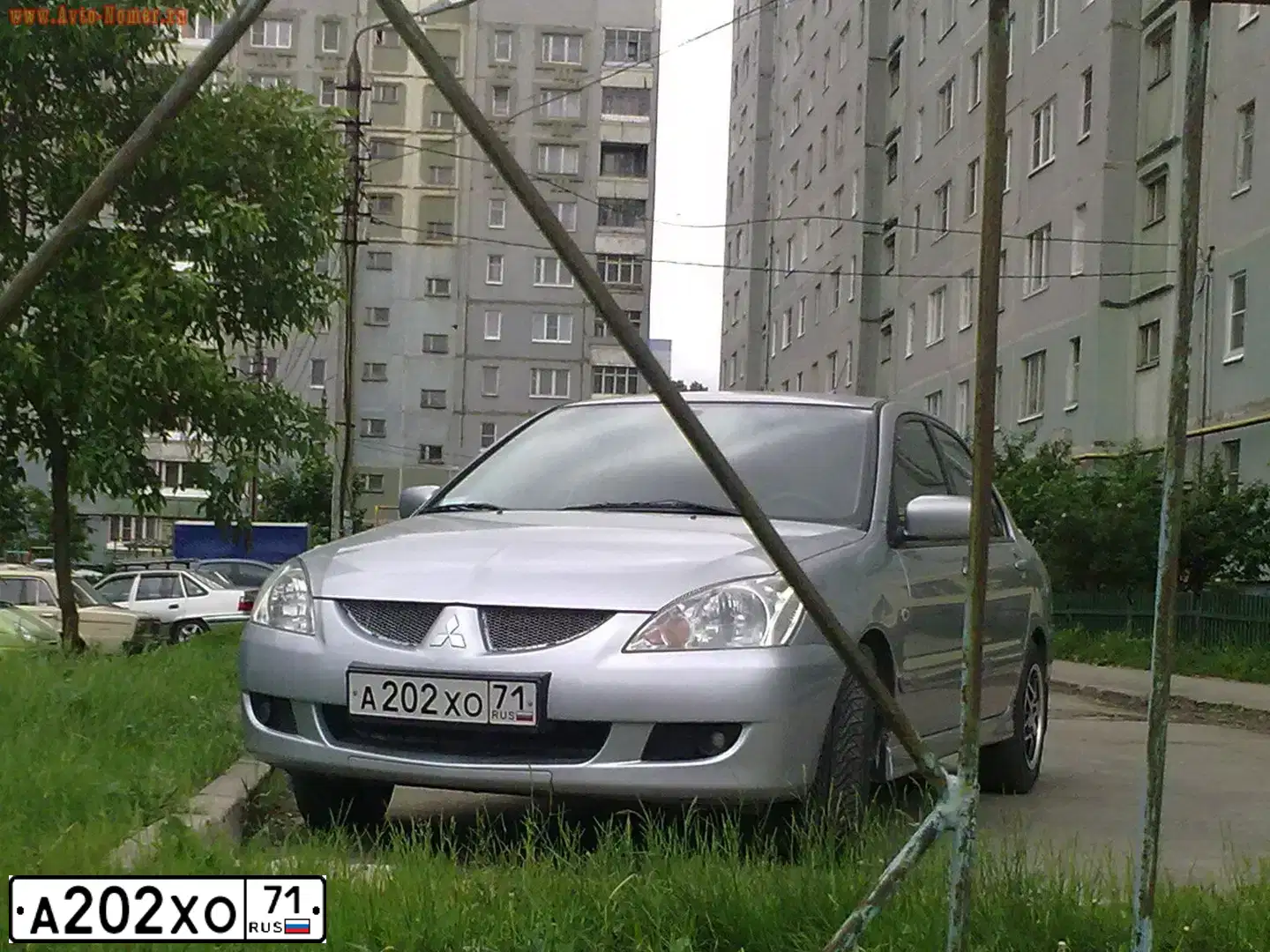 Фото автомобиля MITSUBISHI LANCER, 2004 — госномер А202ХО71
