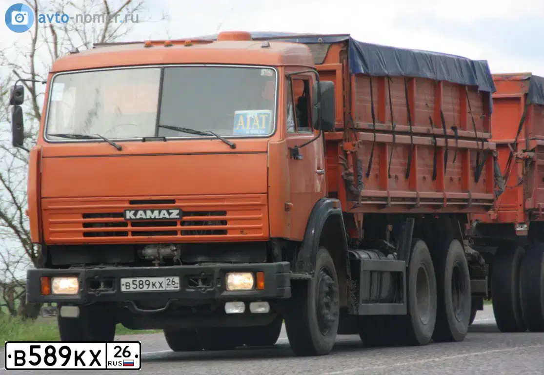 Фото автомобиля KAMAZ / NEFAZ  4514 /6X6/, 2006 — госномер Н303НР126. Цвет: Оранжевый