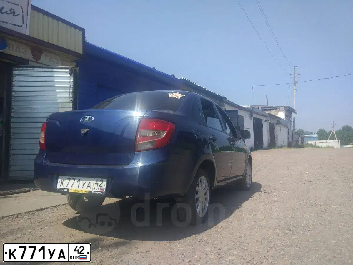 Фото автомобиля LADA GRANTA, 2013 — госномер С288РА142. Цвет: синий