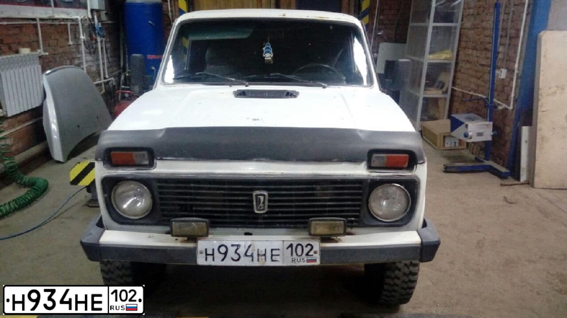 Фото автомобиля LADA 2121 NIVA, 1996 — госномер Е638НС02. Цвет: Белый