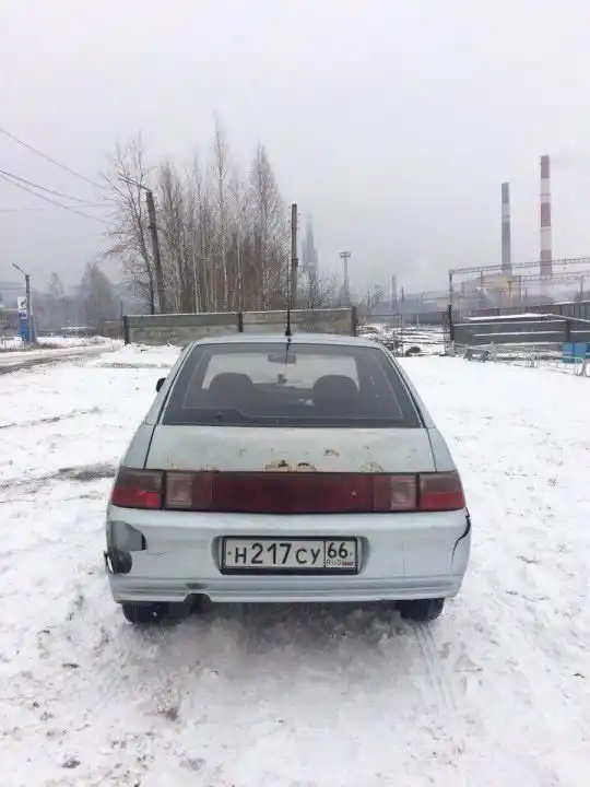 Фото автомобиля LADA 2112, 2001 — госномер Т347ОС196. Цвет: СЕРЕБРИСТО-ГОЛУБОЙ