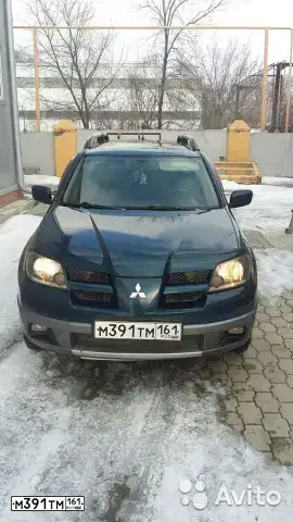 Фото автомобиля MITSUBISHI OUTLANDER, 2004 — госномер Е371РН97. Цвет: СИНИЙ