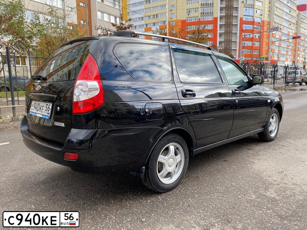 Фото автомобиля LADA 2171 PRIORA, 2010 — госномер Е806ОВ164. Цвет: Сине-Черный