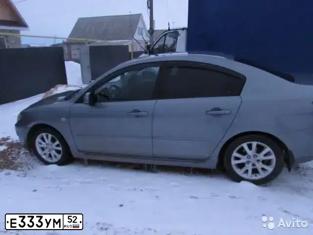 Фото автомобиля ГАЗ 3110, 1998 — госномер Е333УМ52. Цвет: СЕРО-БЕЛЫЙ