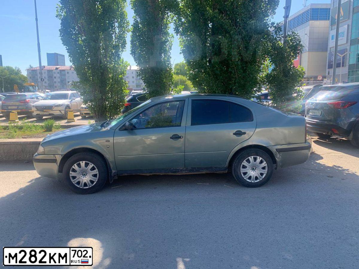 Фото автомобиля SKODA OCTAVIA, 2003 — госномер М282КМ702. Цвет: СЕРО-ЗЕЛЕНЫЙ