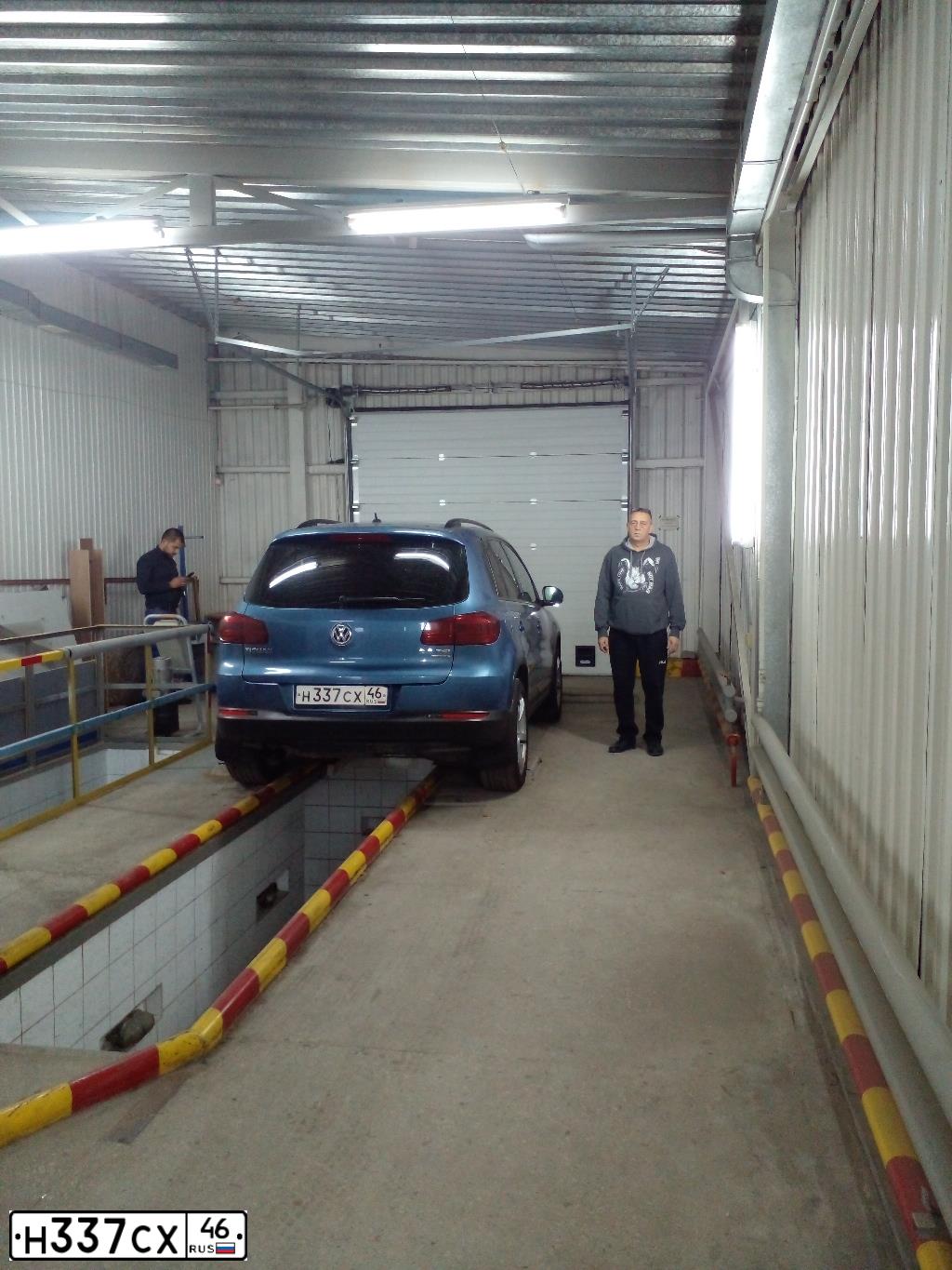 Фото автомобиля VOLKSWAGEN TIGUAN, 2012 — госномер Н337СХ46. Цвет: СЕРО-СИНИЙ
