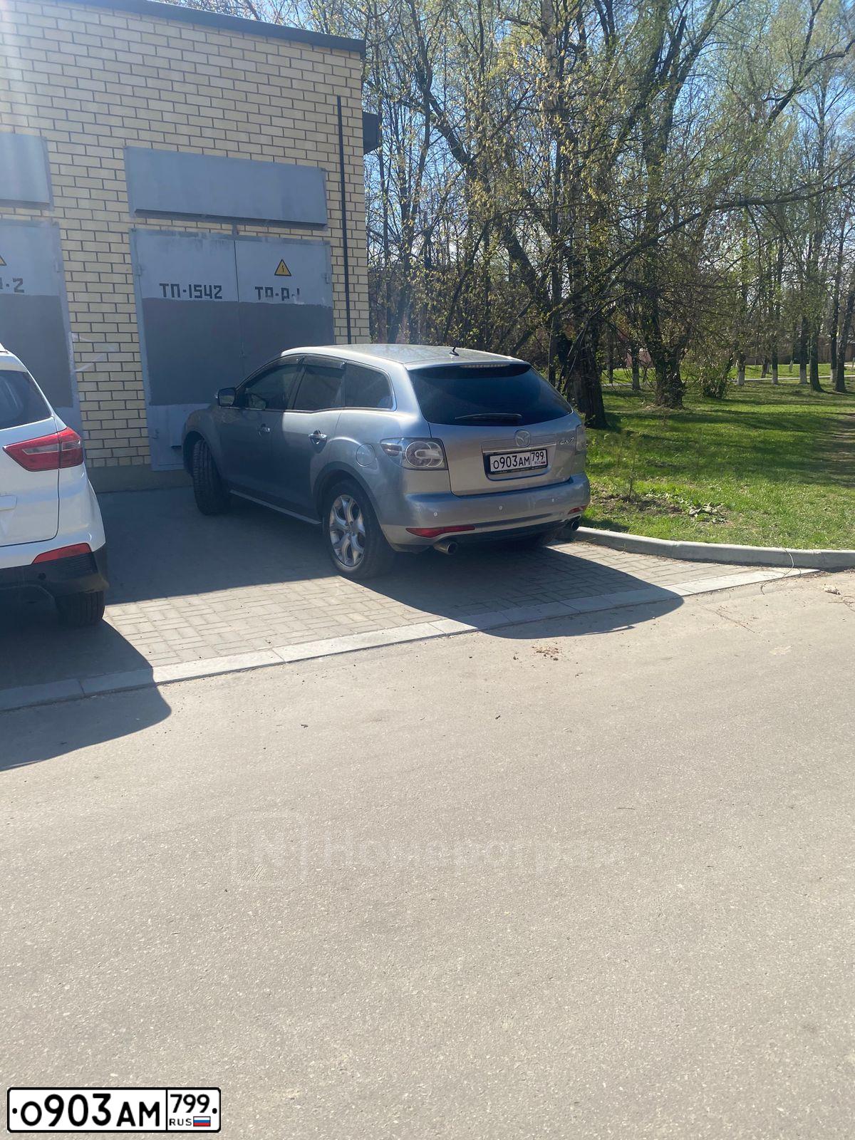 Фото автомобиля MAZDA CX-7, 2010 — госномер О903АМ799. Цвет: Серебристый